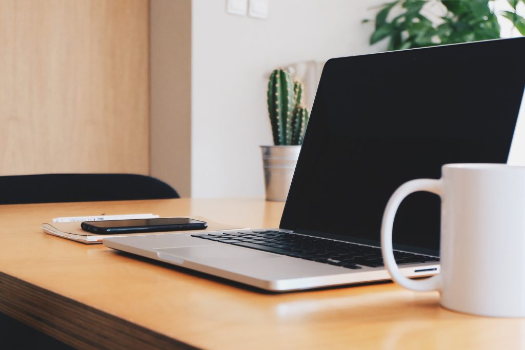 Open laptop on a desk.