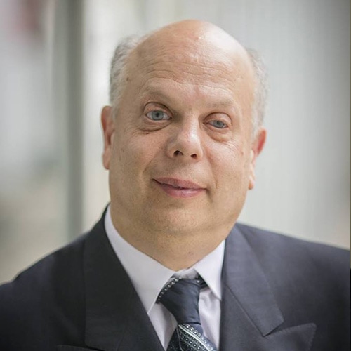 David Lepofsky. A balding man wearing a blue suit.
