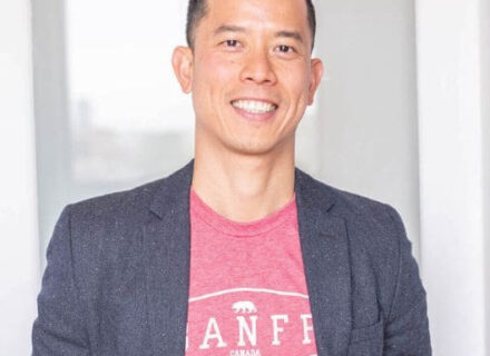 Eugene Woo. A gentleman wearing a Banff t-shirt under a jacket.